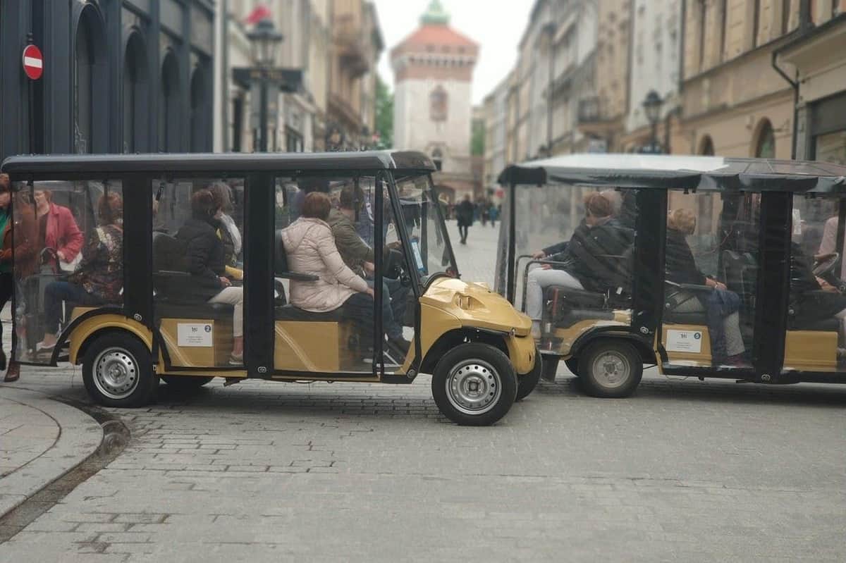 Old Town Krakow: Electric Golf Cart Tour + Audio Guide Floriańska Street with the city gate
